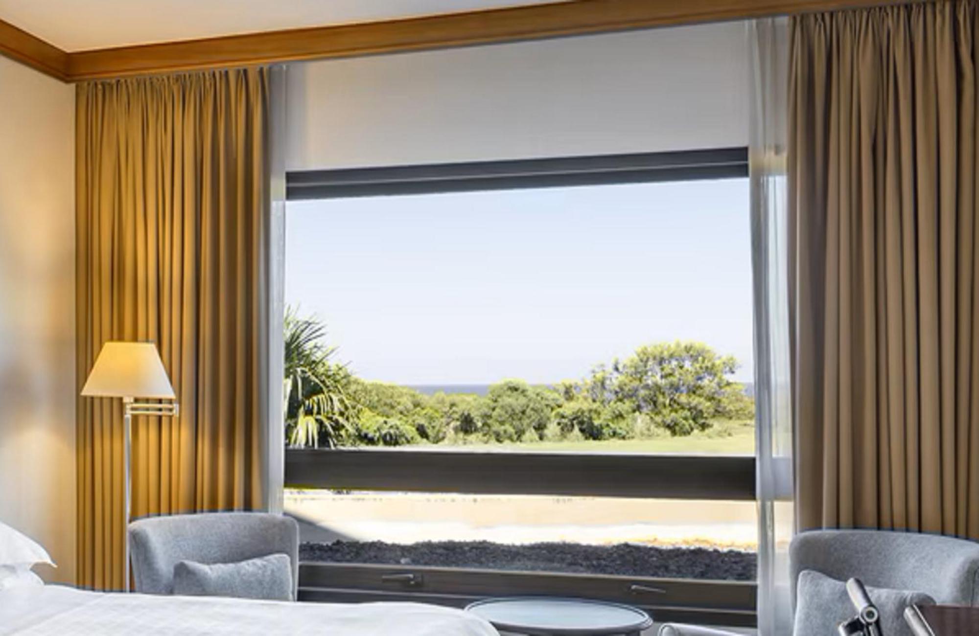 Sheraton Colonia Golf & Spa Resort Colonia del Sacramento Exterior photo A window with a roller blind